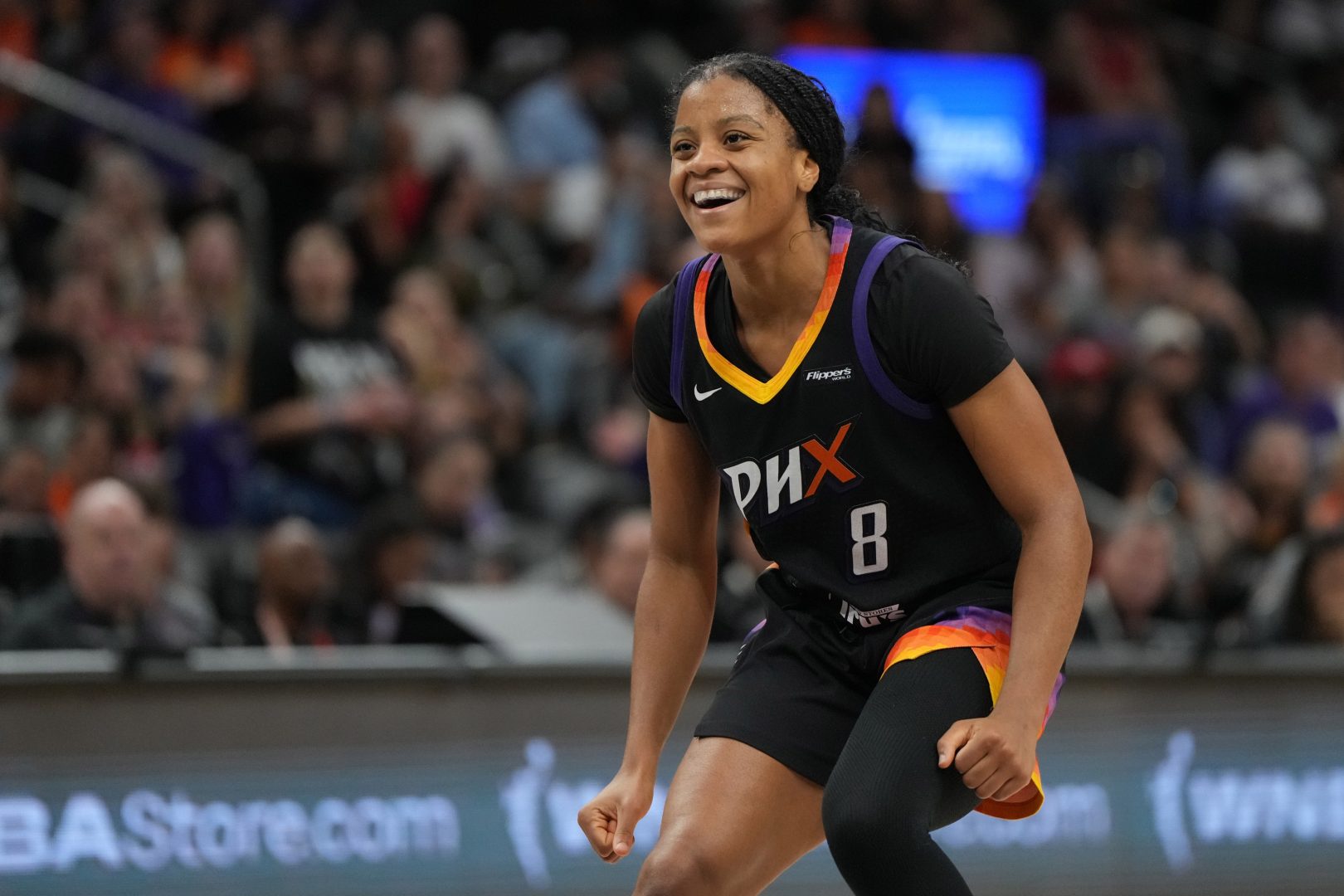 Aug 15, 2025; Phoenix, Arizona, USA; Phoenix Mercury guard Monique Akoa Makani (8) reacts after scoring against the Las Vegas Aces in the second half at Footprint Center. Mandatory Credit: Rick Scuteri-Imagn Images