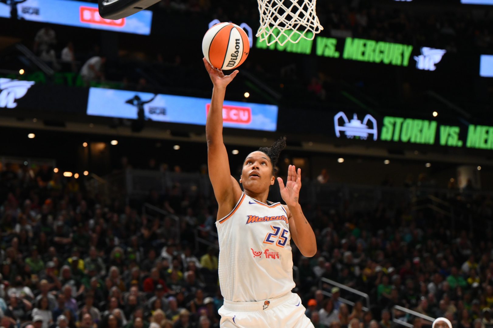 Aug 17, 2025; Seattle, Washington, USA; Phoenix Mercury forward Alyssa Thomas (25) shoots the ball against the Seattle Storm during the first half at Climate Pledge Arena. Mandatory Credit: Steven Bisig-Imagn Images