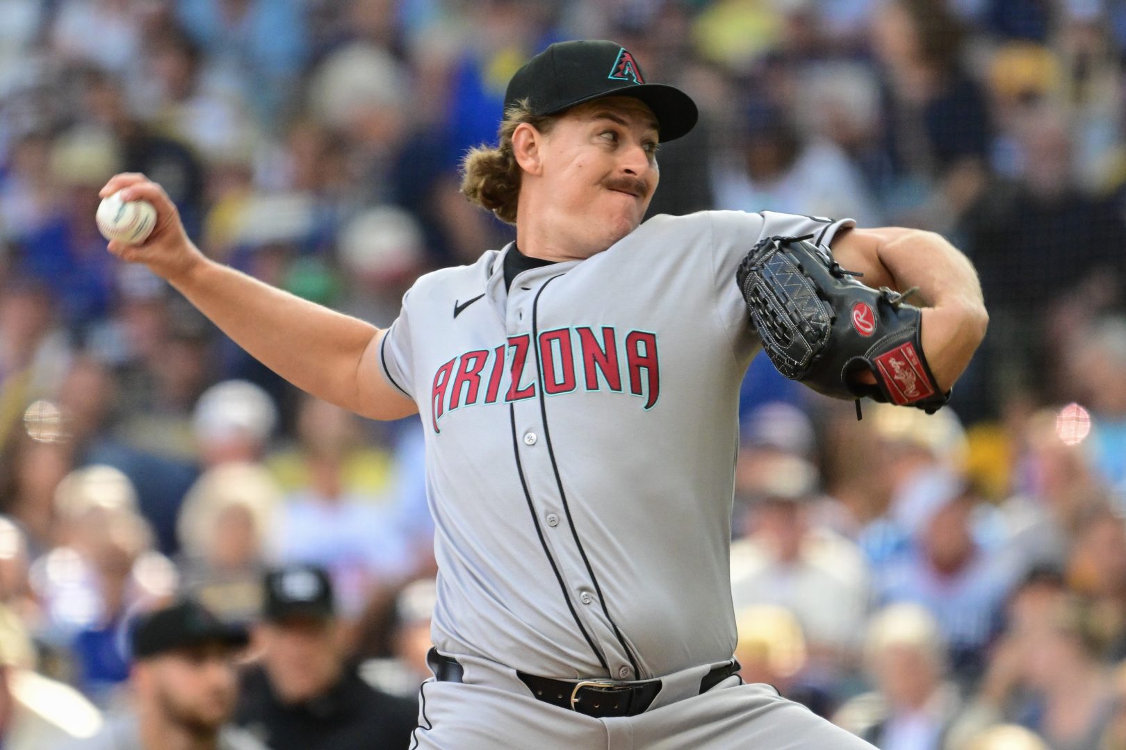 Aug 28, 2025; Milwaukee, Wisconsin, USA; Arizona Diamondbacks relief pitcher Taylor Rashi (54) throws against the Milwaukee Brewers in his major league debut in the seventh inning at American Family Field. Mandatory Credit: Benny Sieu-Imagn Images