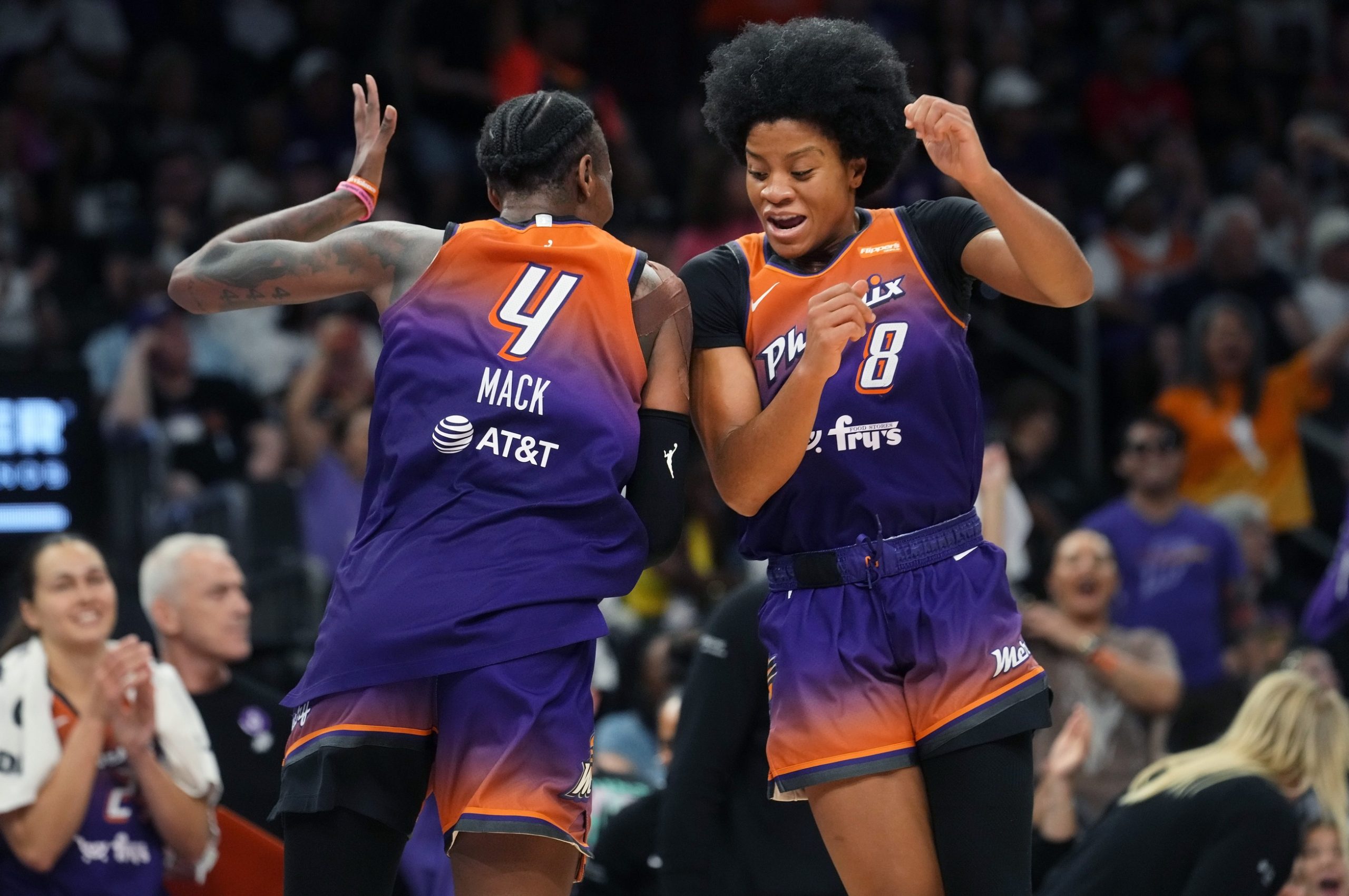 Mercury forward Natasha Mack (4) celebrates her steal with teammate Monique Akoa Makani (8) against the New York Liberty at PHX Arena, Aug. 30, 2025, in Phoenix. © Joe Rondone/The Republic / USA TODAY NETWORK via Imagn Images