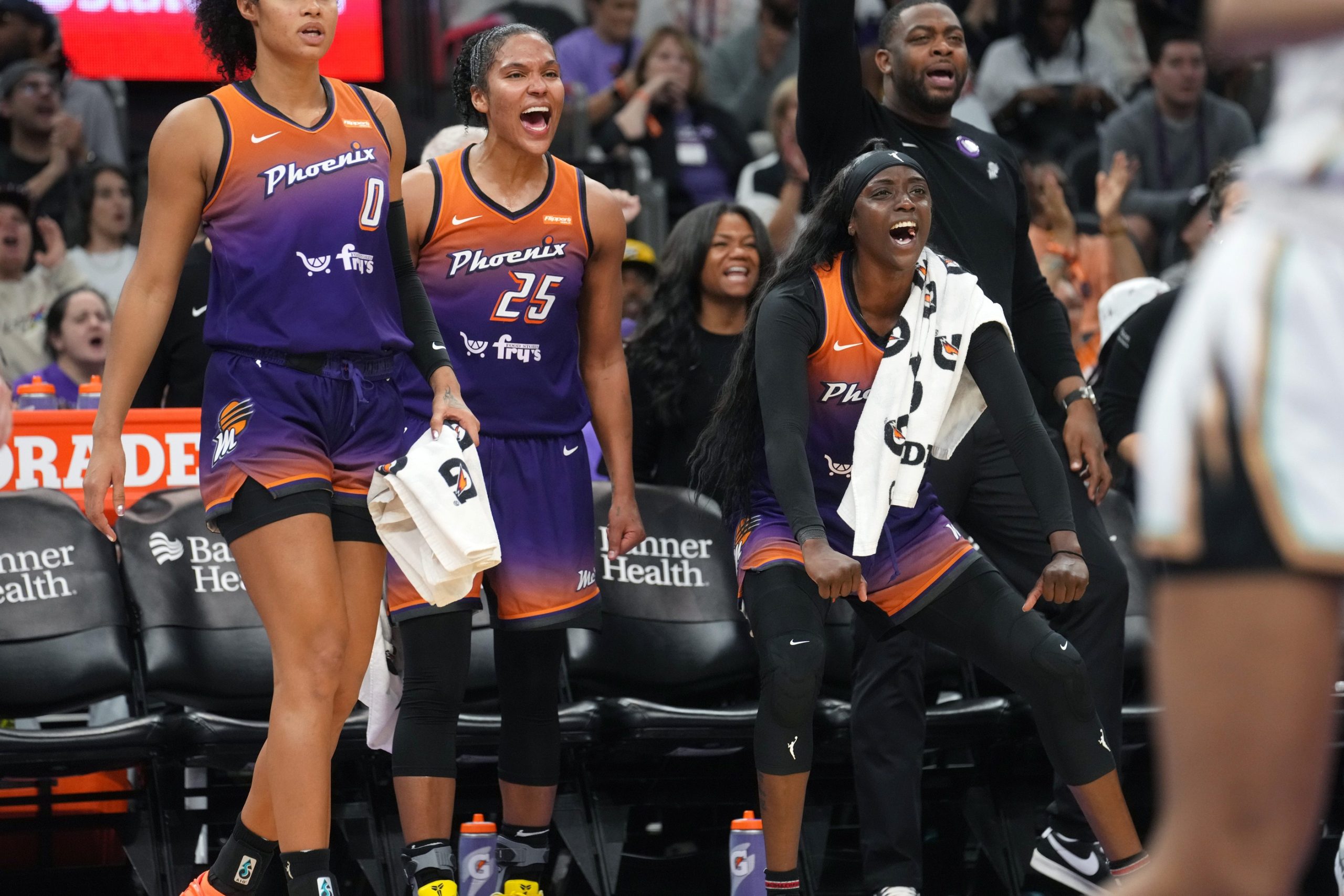 Mercury guard Kahleah Copper (2) and forward Alyssa Thomas (25) cheer on their teammates in the final minutes of their 80-63 win against the New York Liberty at PHX Arena, Aug. 30, 2025, in Phoenix. © Joe Rondone/The Republic / USA TODAY NETWORK via Imagn Images