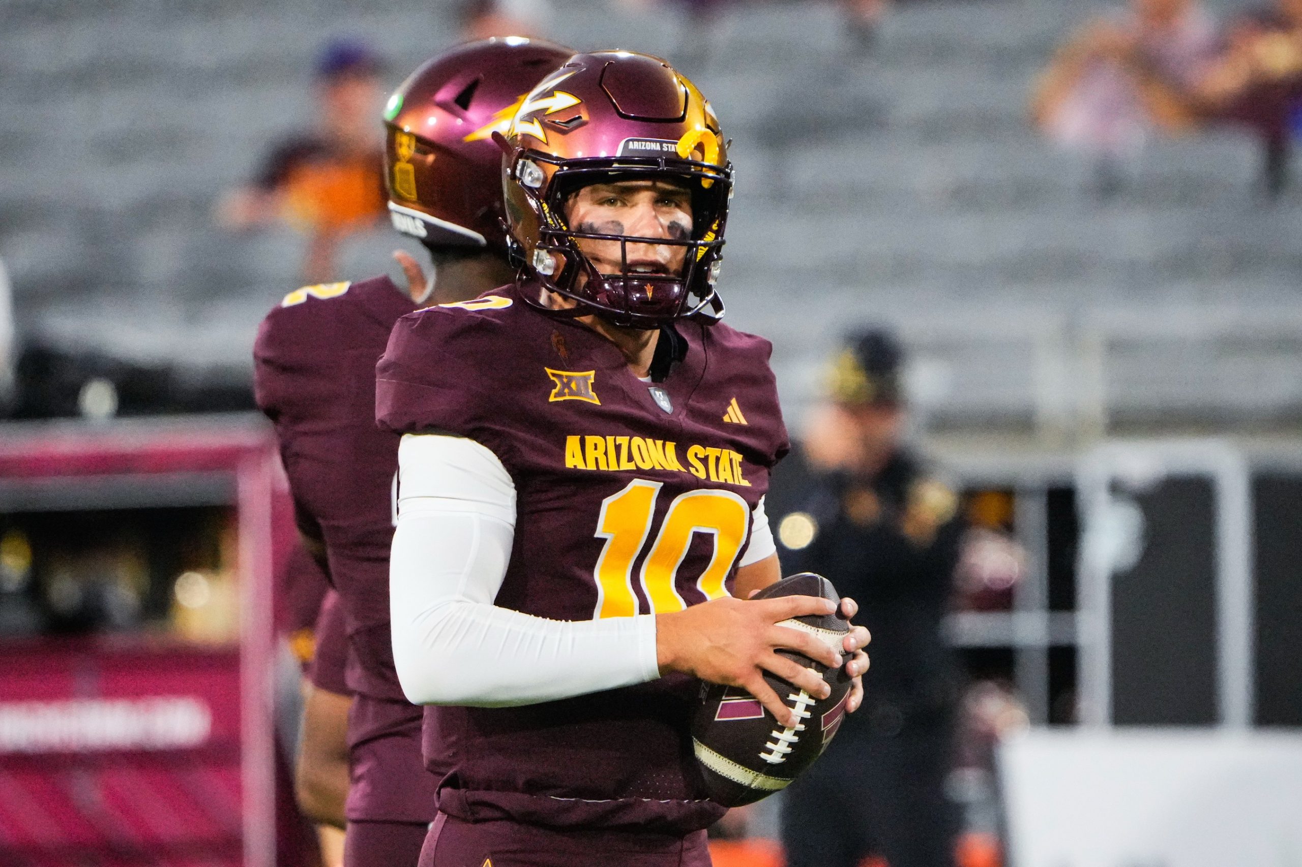 Sep 13, 2025; Tempe, Arizona, USA; Arizona State Sun Devils quarterback Sam Leavitt warms up before the game between Arizona State Sun Devils and Texas State Bobcats. Mandatory Credit: Arianna Grainey-Imagn Images