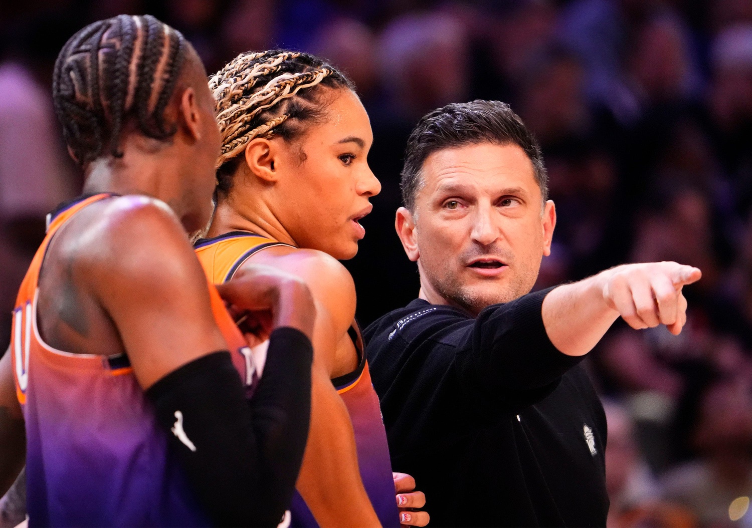 Phoenix Mercury head coach Nate Tibbetts talks with Phoenix forward Satou Sabally (0) during a timeout against the New York Liberty in the first half of Game One of the 2025 WNBA Playoffs first round at PHX Arena on Sept. 14, 2025. © Rob Schumacher/The Republic / USA TODAY NETWORK via Imagn Images