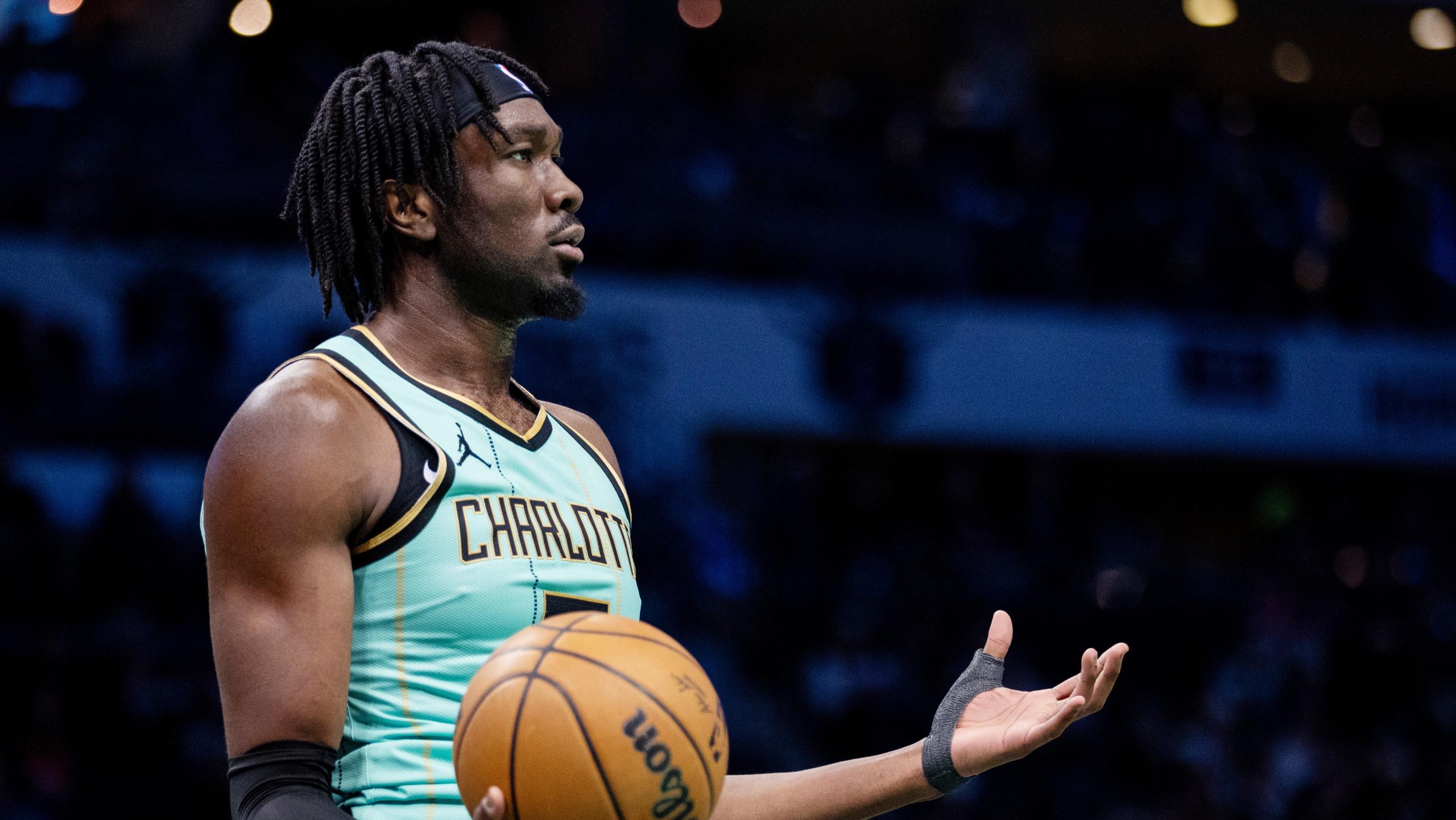 Jan 24, 2025; Charlotte, North Carolina, USA; Former Charlotte Hornets and current Phoenix Suns center Mark Williams (5) reacts after a foul against the Portland Trail Blazers during the third quarter at Spectrum Center. Mandatory Credit: Scott Kinser-Imagn Images