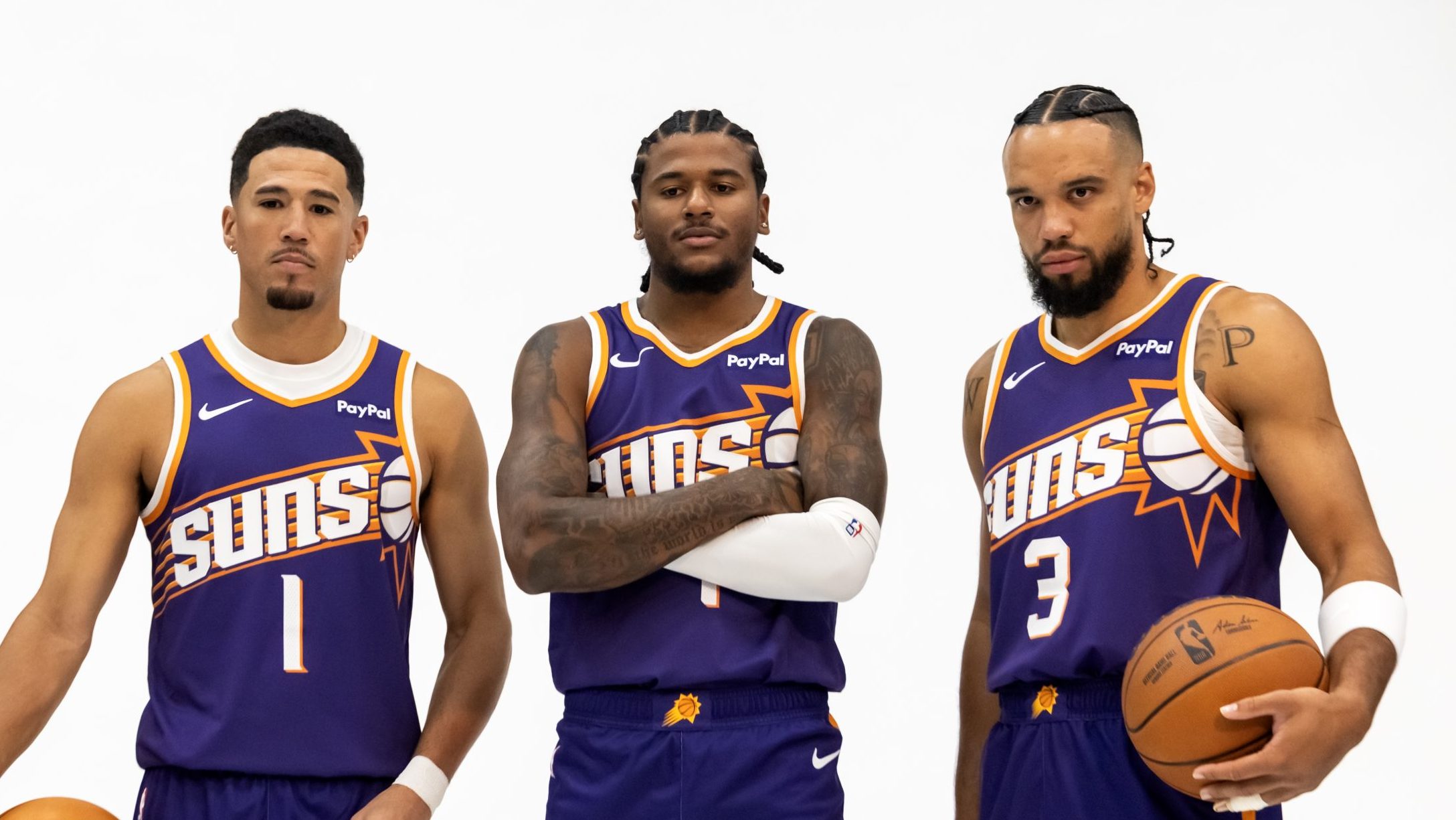 Sep 24, 2025; Phoenix, AZ, USA; Phoenix Suns guard Devin Booker (1), forward Dillon Brooks (3) and guard Jalen Green (4) pose for portrait during Media Day at PHX Arena. Mandatory Credit: Mark J. Rebilas-Imagn Images