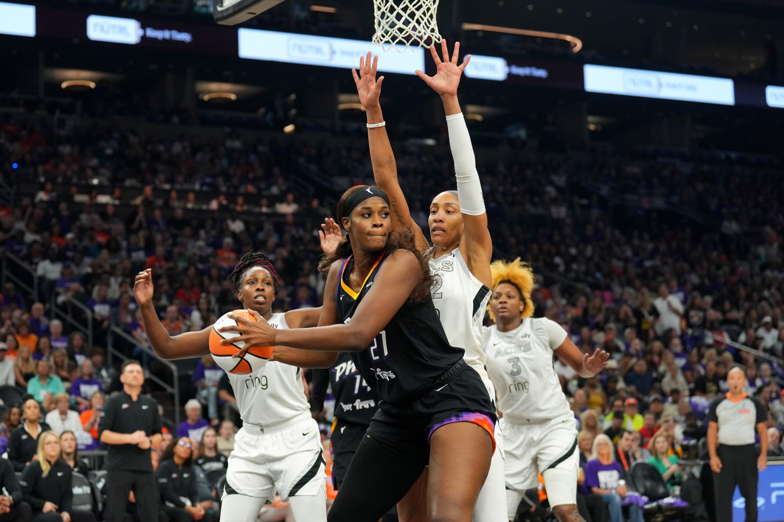 Oct 10, 2025; Phoenix, Arizona, USA; Las Vegas Aces center A'ja Wilson (22) guards Phoenix Mercury center Kalani Brown (21) during the second half of game four of the 2025 WNBA Finals at Mortgage Matchup Center. Mandatory Credit: Joe Camporeale-Imagn Images