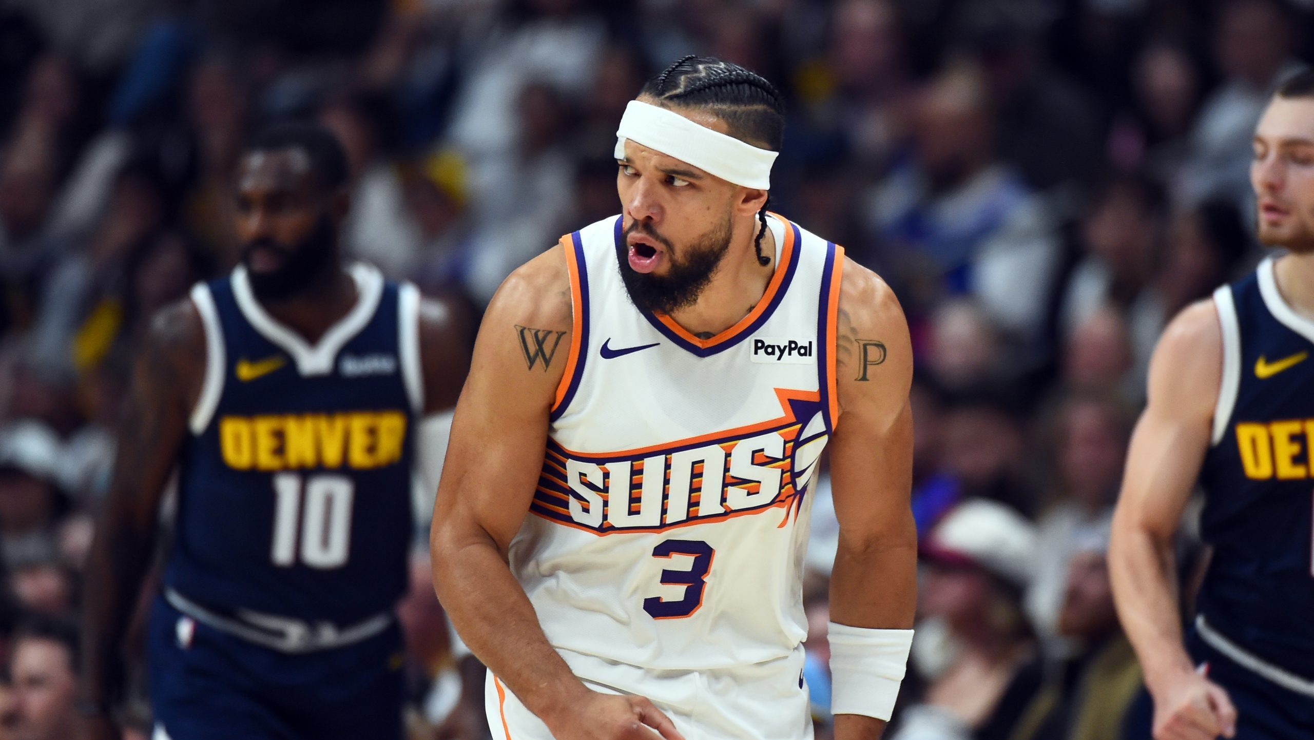 Oct 25, 2025; Denver, Colorado, USA; Phoenix Suns forward Dillon Brooks (3) reacts after making a shot during the first half against the Denver Nuggets at Ball Arena. Mandatory Credit: Christopher Hanewinckel-Imagn Images