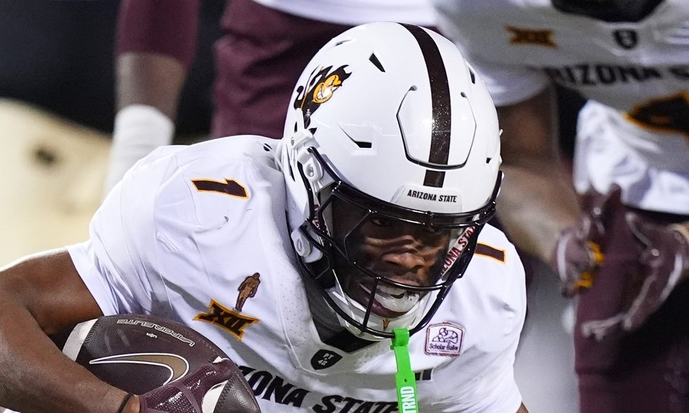 Nov 22, 2025; Boulder, Colorado, USA; Arizona State Sun Devils defensive back Keith Abney II (1) recovers a fumble in the fourth quarter against the Colorado Buffaloes at Folsom Field. Mandatory Credit: Ron Chenoy-Imagn Images