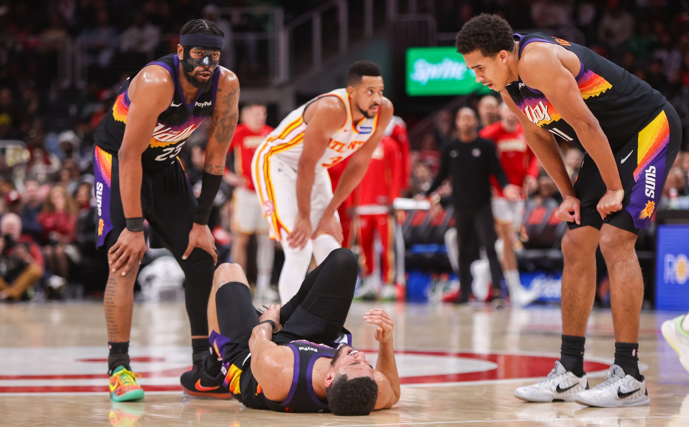 Phoenix Suns fans react to Devin Booker's ankle injury after freak