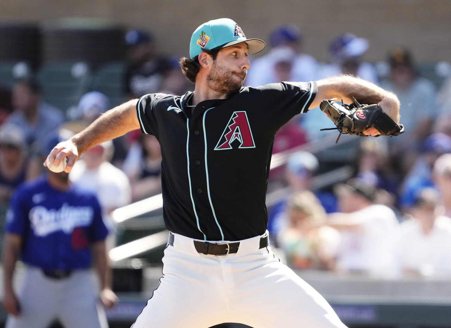 Arizona Diamondbacks pitcher Zac Gallen (23) throws to the Los Angeles Dodgers in the first inning on Feb. 25, 2026, at Salt River Fields in Scottsdale. © Rob Schumacher/The Republic / USA TODAY NETWORK via Imagn Images