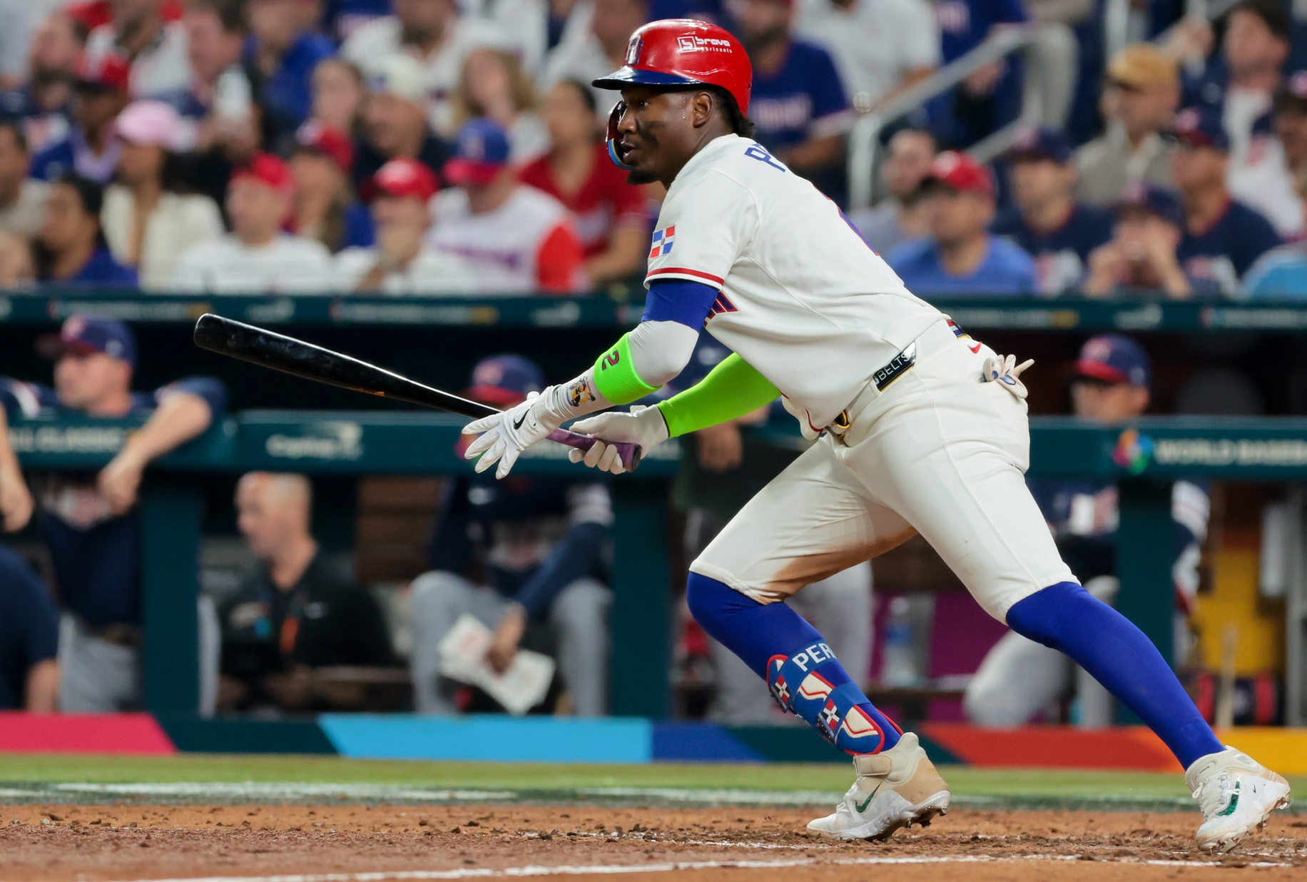 Mar 15, 2026; Miami, FL, United States; Dominican Republic shortstop Geraldo Perdomo (2) singles in the seventh inning against the United States during a semifinal game of the 2026 World Baseball Classic at loanDepot Park. Mandatory Credit: Sam Navarro-Imagn Images