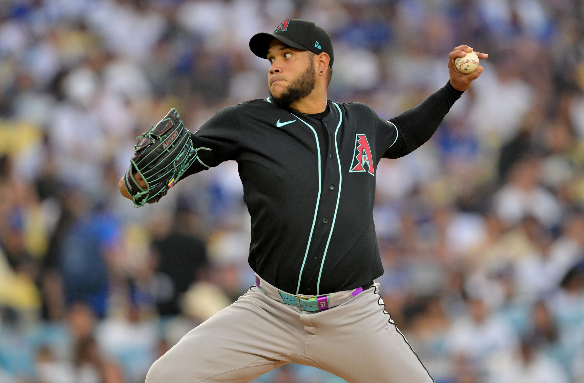 Mar 28, 2026; Los Angeles, California, USA; Arizona Diamondbacks pitcher Eduardo Rodriguez (57) throws during the second inning against the Los Angeles Dodgers at Dodger Stadium. Mandatory Credit: Jayne Kamin-Oncea-Imagn Images
