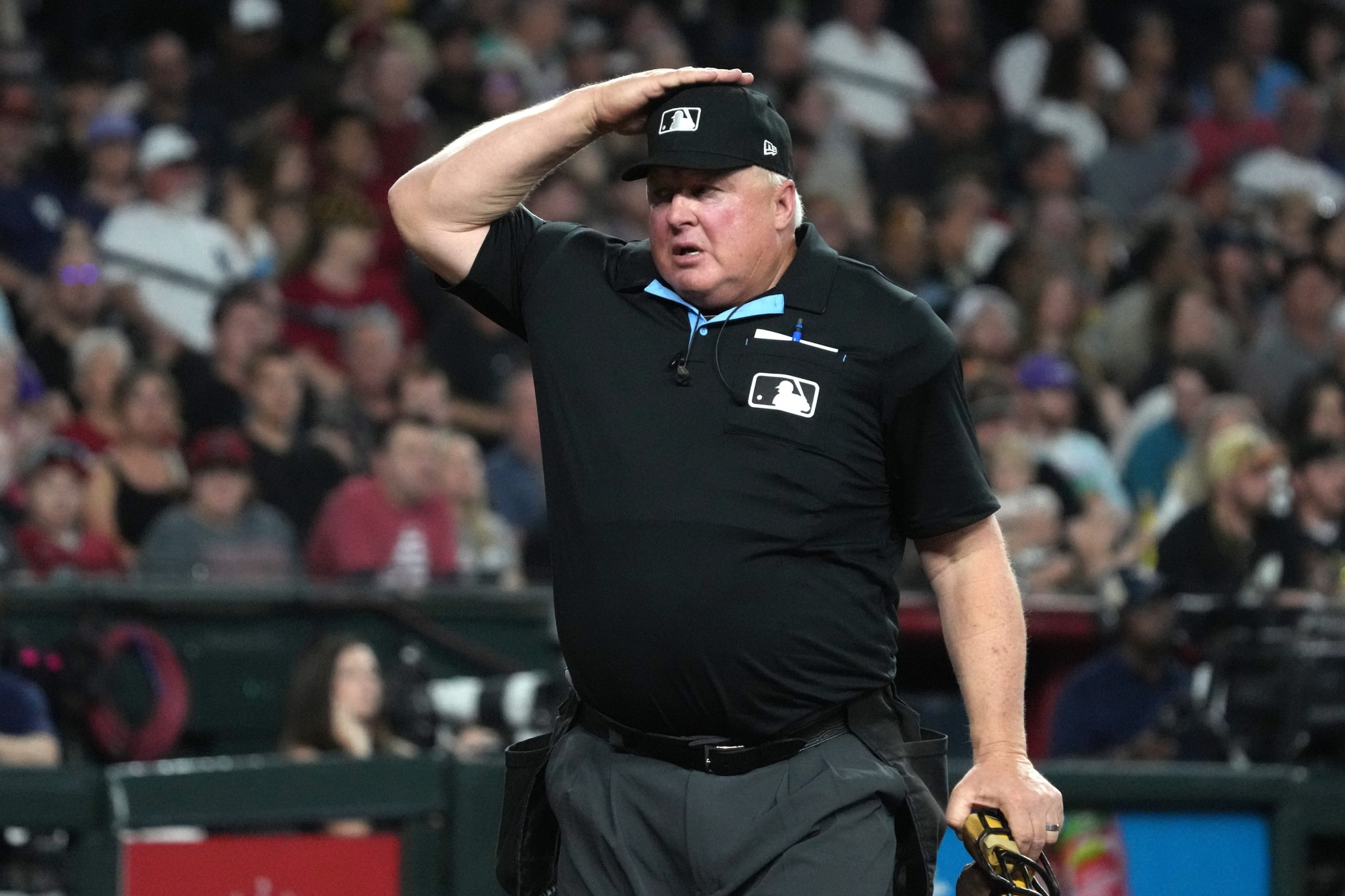 Mar 31, 2026; Phoenix, Arizona, USA; MLB umpire Bill Miller (26) signals for a pitch challenge for the Arizona Diamondbacks against the Detroit Tigers in the third inning at Chase Field. Mandatory Credit: Rick Scuteri-Imagn Images