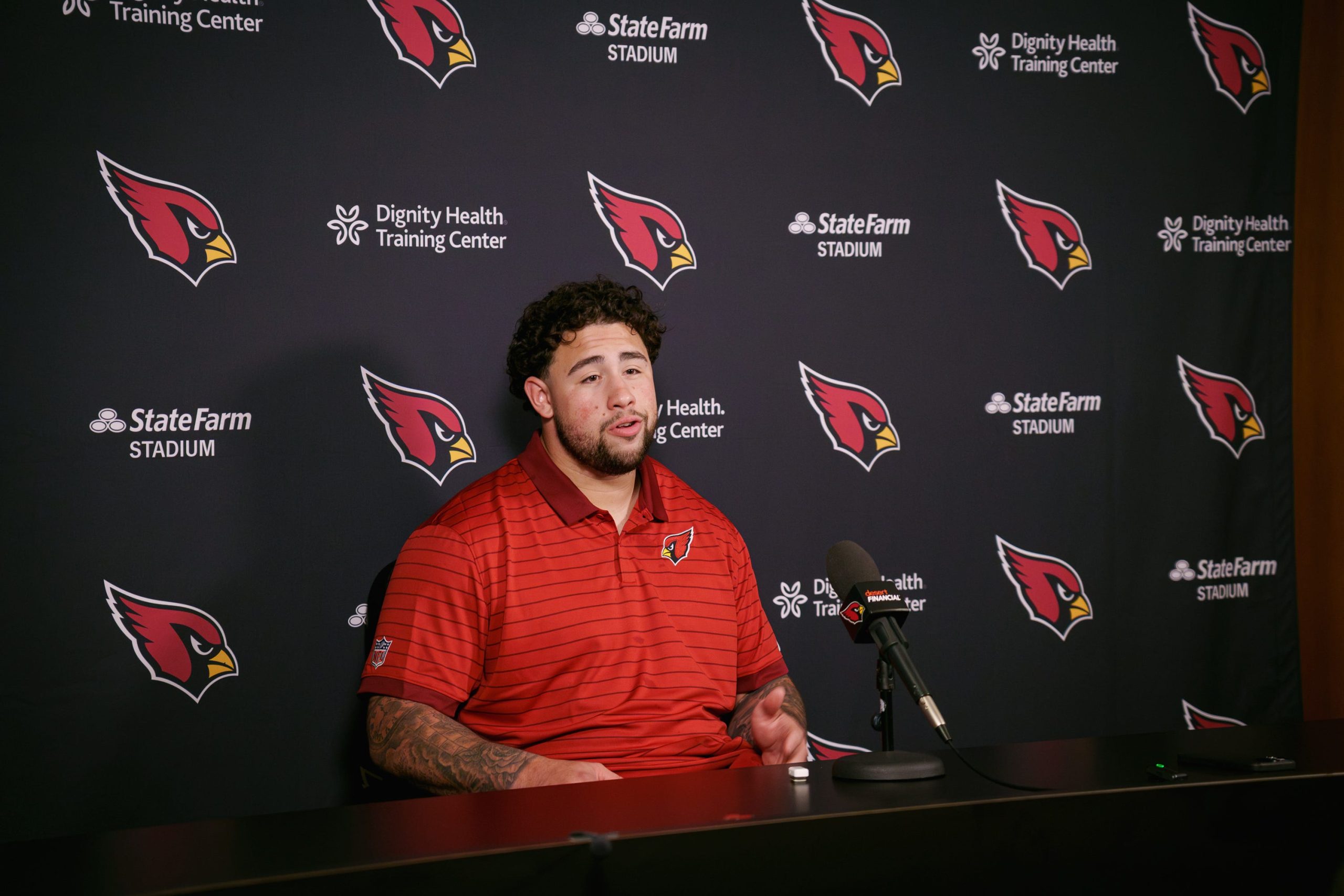 Cardinals rookie lineman from Texas A&M, Chase Bisontis, speaks to the media at the Arizona Cardinals training center on May 11, 2026, in Tempe.