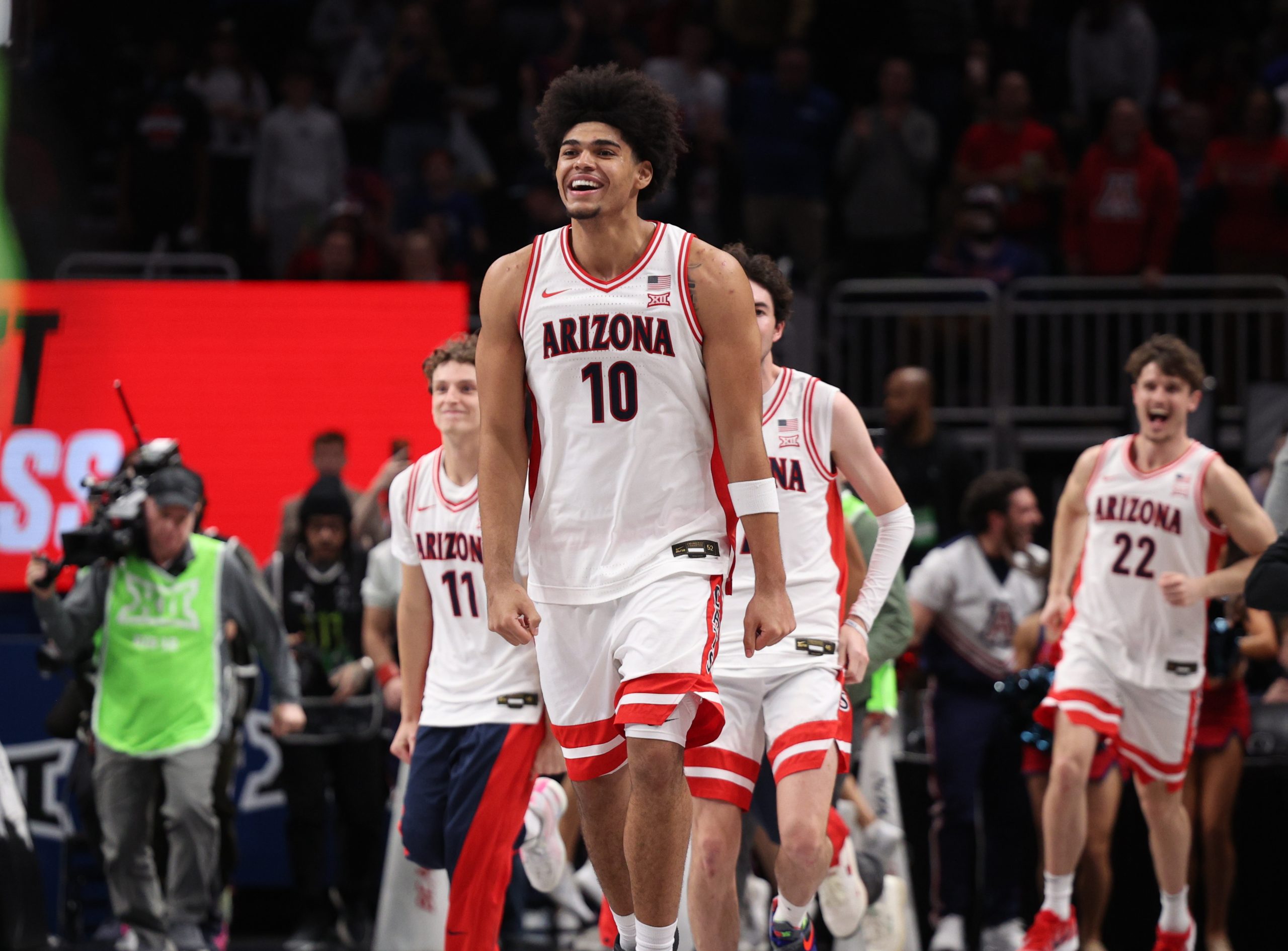 Mar 14, 2026; Kansas City, MO, USA; Arizona Wildcats forward Koa Peat (10) reacts after defeating the Houston Cougars during the men's Big 12 Conference Tournament Championship at T-Mobile Center. Mandatory Credit: William Purnell-Imagn Images Suns