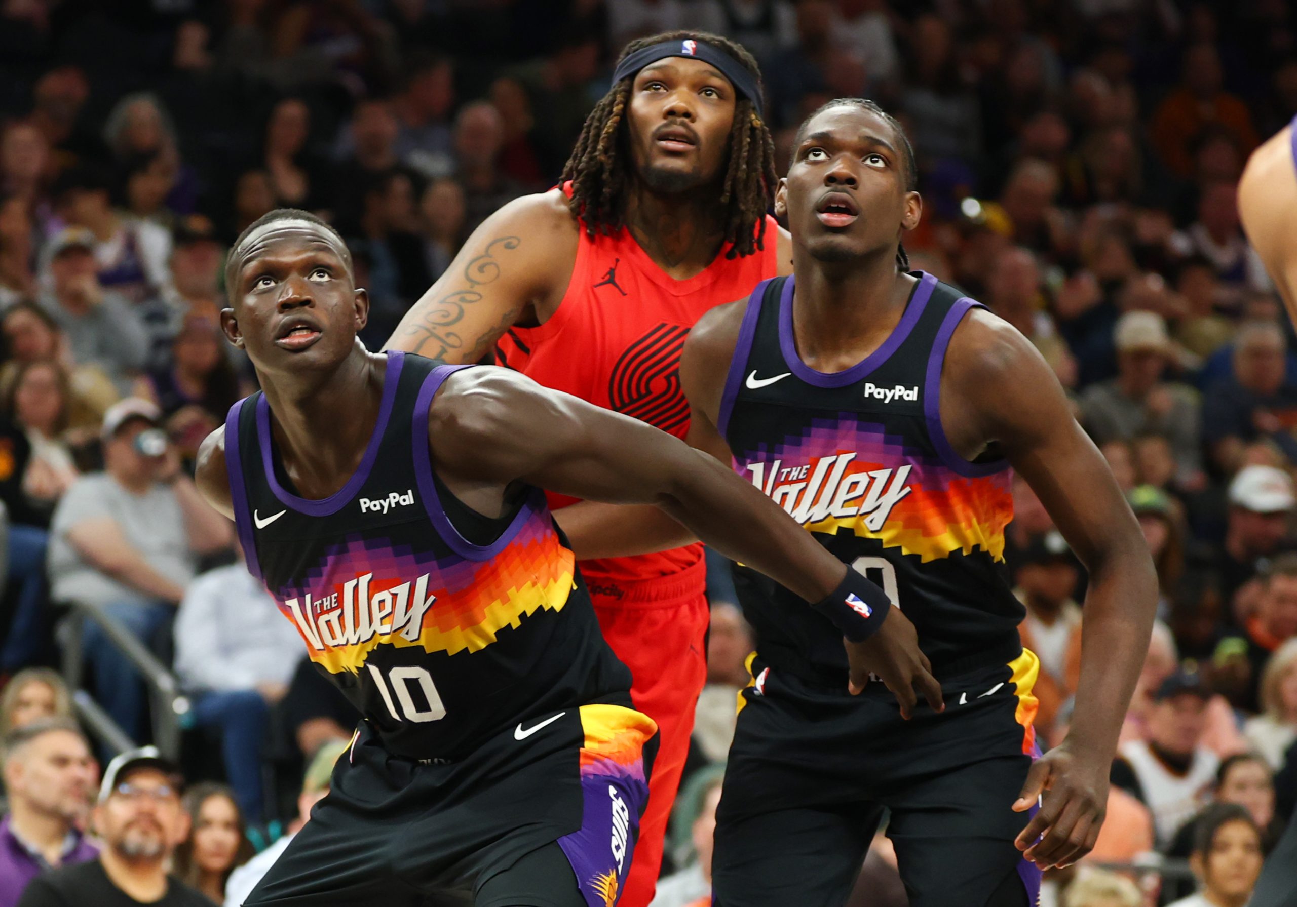 Feb 22, 2026; Phoenix, Arizona, USA; Phoenix Suns center Khaman Maluach (10) and forward Rasheer Fleming (20) against the Portland Trail Blazers at Mortgage Matchup Center. Mandatory Credit: Mark J. Rebilas-Imagn Images