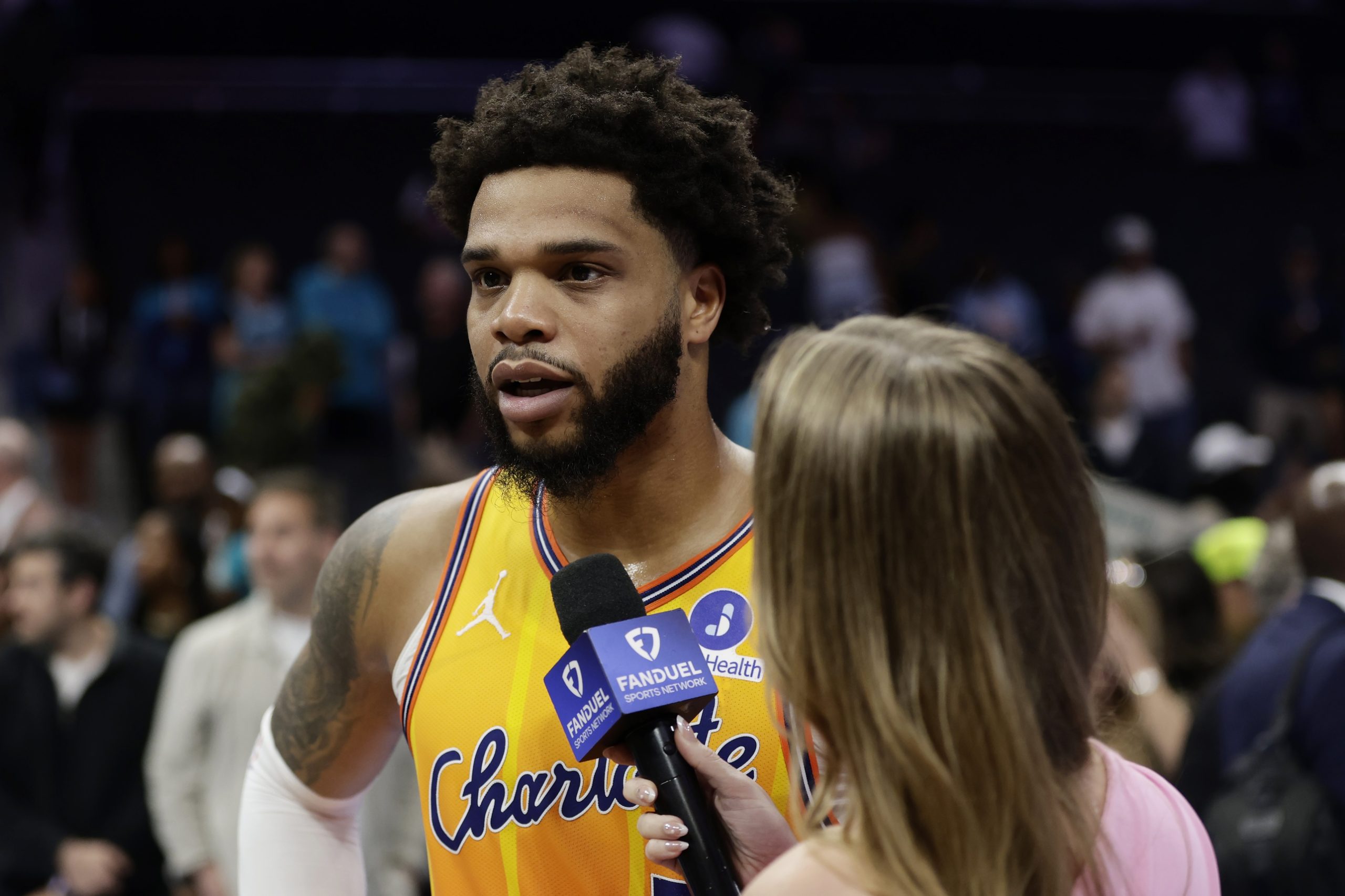 Mar 21, 2026; Charlotte, North Carolina, USA; Charlotte Hornets forward Miles Bridges (0) is interviewed by Ashley Stroehlein of Fan Duel following the game against the Memphis Grizzlies at Spectrum Center. Mandatory Credit: Brian Westerholt-Imagn Images