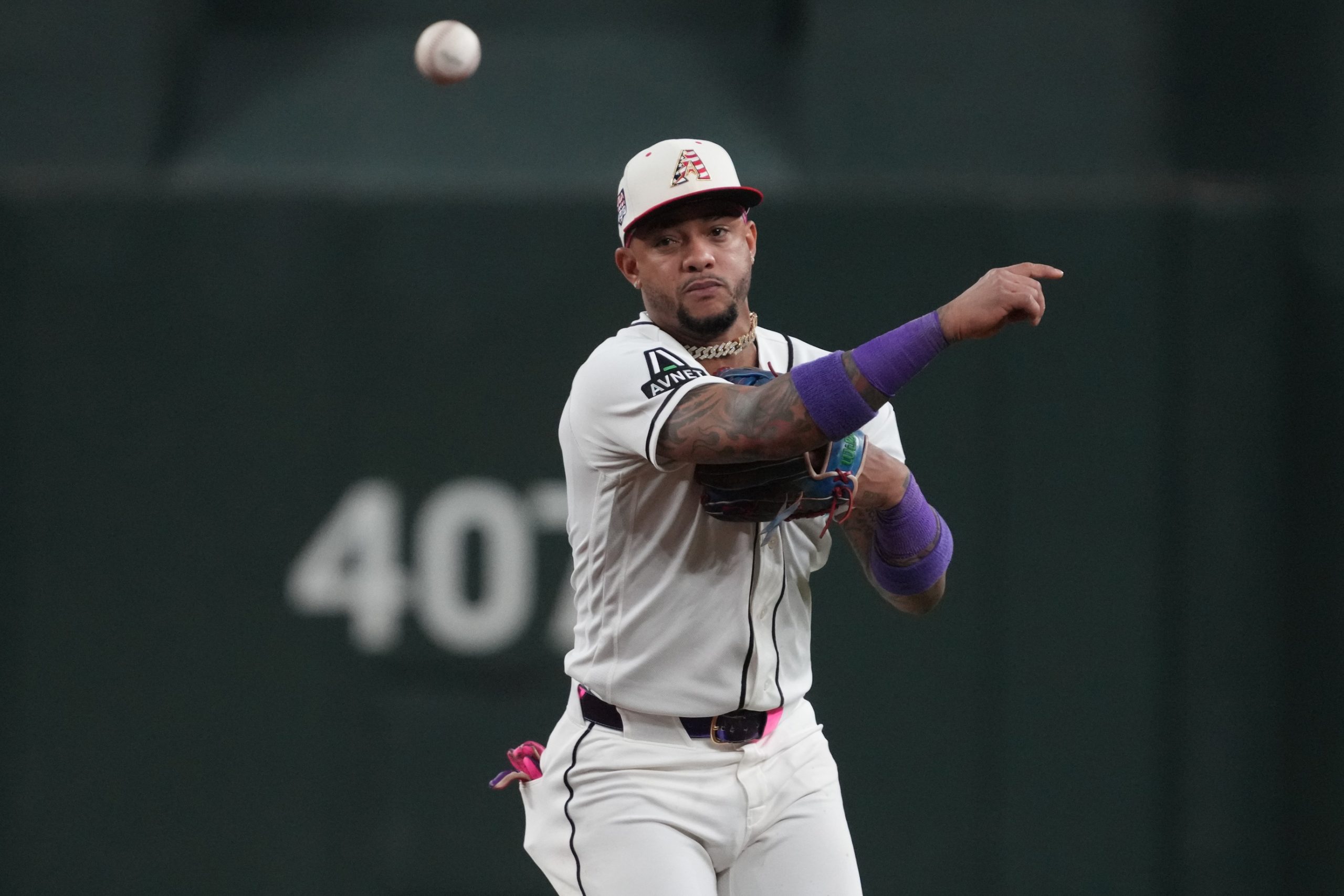 Jul 4, 2026; Phoenix, Arizona, USA; Arizona Diamondbacks second baseman Ketel Marte (4) makes the play against the Milwaukee Brewers in the ninth inning at Chase Field. Mandatory Credit: Rick Scuteri-Imagn Images