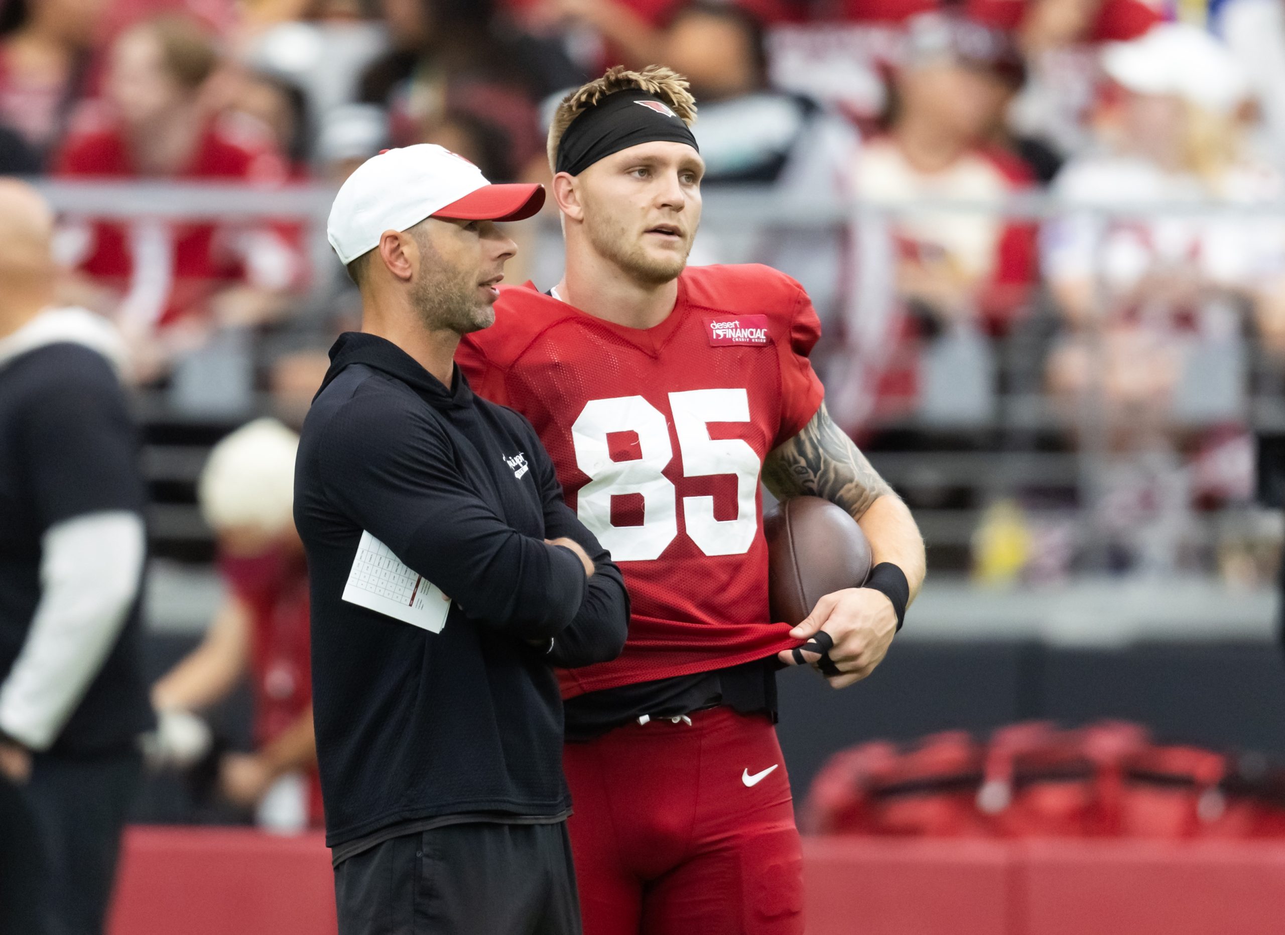 Aug 2, 2025; Glendale, AZ, USA; Arizona Cardinals head coach Jonathan Gannon with tight end Trey McBride (85) in the Red and White practice during training camp at State Farm Stadium. Mandatory Credit: Mark J. Rebilas-Imagn Images